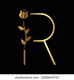 Elegant Golden Letter R with Floral Design on Black Background for Luxury Branding and Aesthetic Appeal