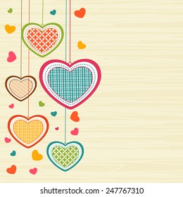 Elegant greeting card design with creative hanging hearts for Happy Valentines Day celebration.