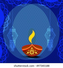 Elegantes Grußkartendesign mit kreativer Öllampe auf floralem, dekoriertem blauen Hintergrund für das Indian Festival of Lights, Happy Diwali Feier.