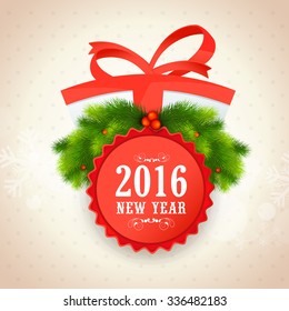 Elegant greeting card design decorated with wrapped gift and fir tree branches for Happy New Year 2016 celebration.