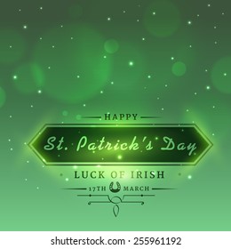 Elegant greeting card design for Happy St. Patrick's Day celebration on shiny green background.