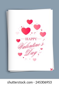 Elegant greeting card design with pink hearts for Happy Valentines Day celebration.