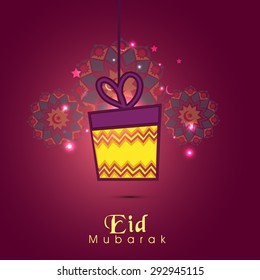 Elegant greeting card with shiny hanging gift on floral design decorated purple background for famous Islamic festival, Eid celebration.  