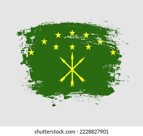 Elegant grungy brush flag with Adygea national flag vector