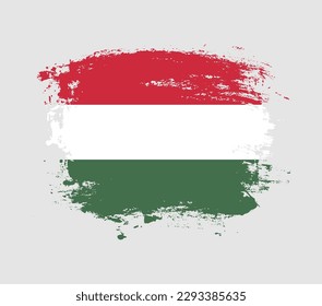 Elegant grungy brush flag with Hungary national flag vector