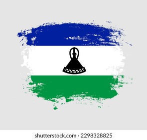 Elegant grungy brush flag with Lesotho national flag vector