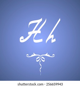 Elegant handmade alphabet. Hand drawn letters. Letters of the alphabet written with a brush. Calligraphic alphabet. Upper case letter, lower case letter. Letter H