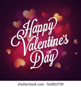 Elegant Happy Valentine's Day Typographical Background decorated by glossy glowing Hearts.