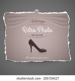 elegant high-heeled leather female shoe vintage retro photo with pushpin on gray background