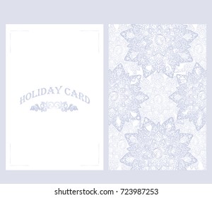 Elegant holiday card with blue vintage patterns