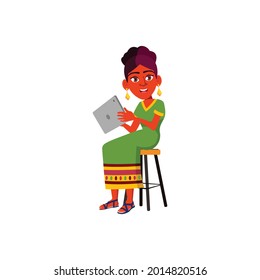 elegant indian girl searching funny video on tablet cartoon vector. elegant indian girl searching funny video on tablet character. isolated flat cartoon illustration