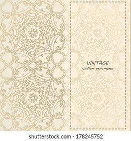 Elegant Indian ornamentation on a light beige  background. Stylish design. Can be used as a greeting card or wedding invitation 