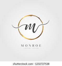 Elegant Initial Letter Type M Logo With Gold Circle Brushed
