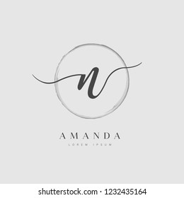 Elegant Initial Letter Type N Logo With Brushed Circle 