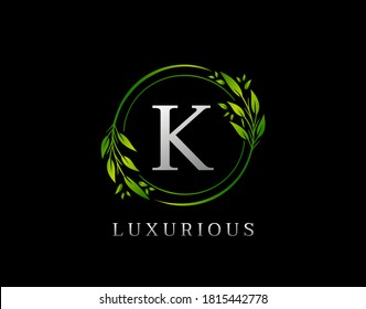 Elegant K Letter Green Floral Design. Circle Green Leaf K Logo Icon.