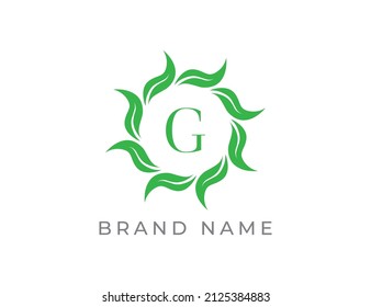 Elegant Leaf Flower Emblem Logo with Letter G. Vector logo template