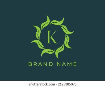 Elegant Leaf Flower Emblem Logo with Letter K. Vector logo template