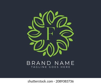 Elegant Leaf Flower symbol icon Logo vector design with Letter F. Vector logo Illustration template