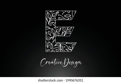 Logotipo elegante de la letra E hecho de flores con hojas y textura de patrón floral en el logotipo de diseño de la ilustración de vectores creativos de Monoline