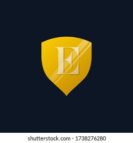 letra elegante E en la ilustración del escudo