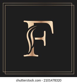 Elegant letter F Graceful Royal Calligraphic Beautiful Logo. Vintage Gold Drawn Emblem for Book Design, Brand Name, Business Card, Restaurant, Boutique, or Hotel