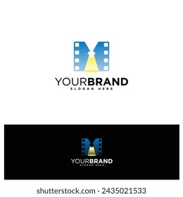 Elegant letter M with strip film and spot light for film production logo design concept. Vector illustration