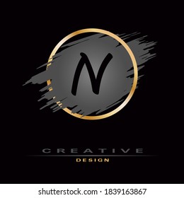 Elegant Letter N Logo with Brush Stroke and Gold Circle. Initial Letter Logo Design. Creative template suitable for business company, logotype, emblem, monogram, icon, jewelry, cosmetic and brand name