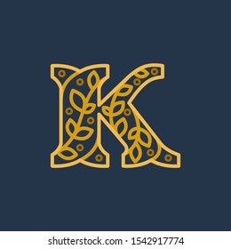 Elegant linear letter K initial ornate logotype. Premium vector typeface with leaves and dots for real estate, luxury, elegant, glamour, fashion, boutique icon symbol.