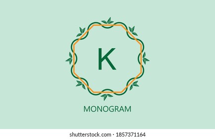 Elegant logo design with round leaves with the letter K on a light green background. Exquisite business sign template, identity card, label, restaurant, sign, shop.