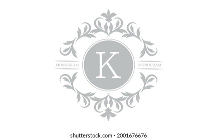 Un elegante logotipo o una plantilla de diseño monograma con la letra K. Un elegante símbolo de carta de lujo para las marcas de cosmética, real y joyería. Ilustración del vector