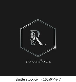 Elegant Luxurious Initial Letter R logo icon vector design. Silver color logo hexagon geometric shape with floral leaf letter icon.