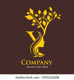 Elegant and luxury gold color of initial letter Y with girl face and branch of tree ornament.
