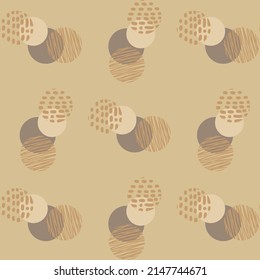 An elegant luxury pattern for expensive and beautiful packaging. Beige circles on a beige background.