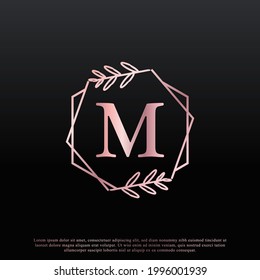 Elegant M Letter Hexagon Floral Logo with Creative Elegant Leaf Monogram Branch Line and Pink Black Color. Usable for Business, Fashion, Cosmetics, Spa, Science, Medical and Nature Logos.