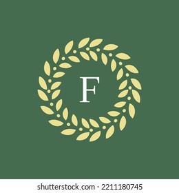 elegant and modern letter F circle leaf emblem logo