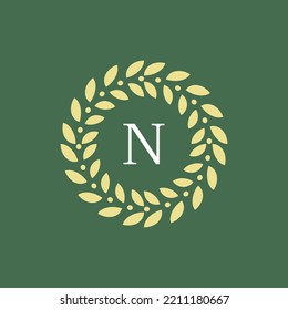 elegant and modern letter N circle leaf emblem logo