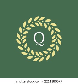 elegant and modern letter Q circle leaf emblem logo