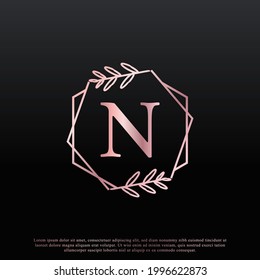 Elegant N Letter Hexagon Floral Logo with Creative Elegant Leaf Monogram Branch Line and Pink Black Color. Usable for Business, Fashion, Cosmetics, Spa, Science, Medical and Nature Logos.