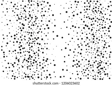 Elegant pattern with black polka dots of small and large scale. Splatter background. Black glitter blow explosion and splats on white. Grunge texture. Vector illustration