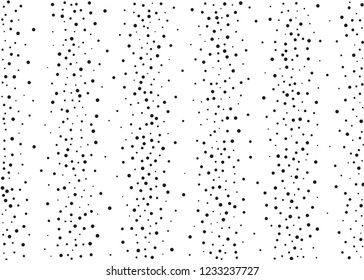 Elegant pattern with black polka dots of small and large scale. Splatter background. Black glitter blow explosion and splats on white. Grunge texture. Vector illustration