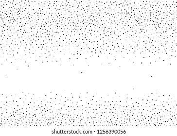 Elegant pattern with black polka dots of small and large scale. Splatter background. Black glitter blow explosion and splats on white. Grunge texture. Vector illustration