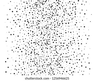 Elegant pattern with black polka dots of small and large scale. Splatter background. Black glitter blow explosion and splats on white. Grunge texture. Vector illustration