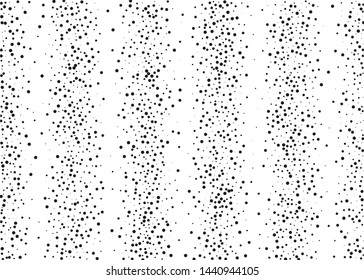 Elegant pattern with black polka dots of small and large scale. Splatter background. Black glitter blow explosion and splats on white. Grunge texture. Vector illustration