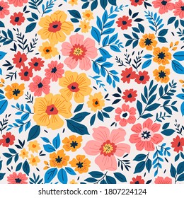 Elegant pattern in small colorful flowers. Liberty style. Floral seamless background. Ditsy print. Vector texture. A bouquet of spring flowers for fashion prints.