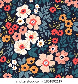 Elegant pattern in small colorful flowers. Liberty style. Floral seamless background. Ditsy print. Vector texture. A bouquet of spring flowers for fashion prints. Stock illustration.