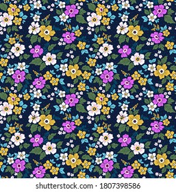 Elegant pattern in small flowers. Liberty style. Floral seamless background. Ditsy print. Vector texture. A bouquet of spring flowers for fashion prints.