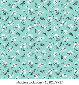 Elegant pattern in small flowers are scattered on the surface. Liberty style. Floral seamless background. Ditsy print. Vector texture. A bouquet of spring flowers for fashion prints.