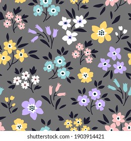 En la superficie, las flores son elegantes. Estilo de la libertad. Fondo floral sin fisuras. Impresión Ditsy. Textura vectorial. Un ramo de flores primaverales para estampas de moda. Vector de material.