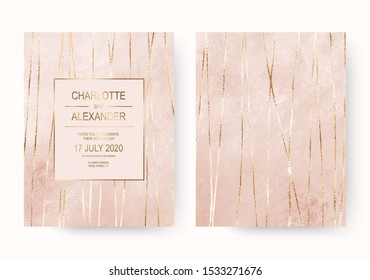 Elegant pink wedding invitation cards with gold foil stripes.