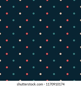 Elegant polka dot seamless pattern. Gold, red, green colors. Small dots on dark blue background. 